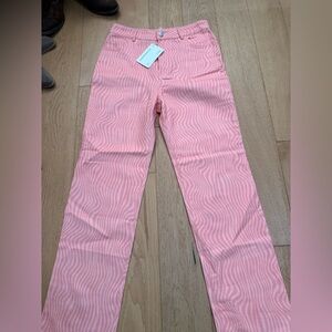 Peppermayo Electric Avenue Pants in the color "Pink Wave," size AU10/US6.
NWT